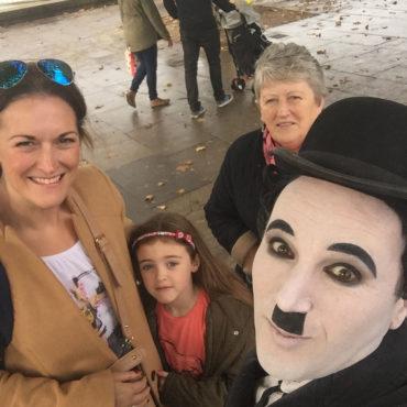 Family with Charlie Chaplin character